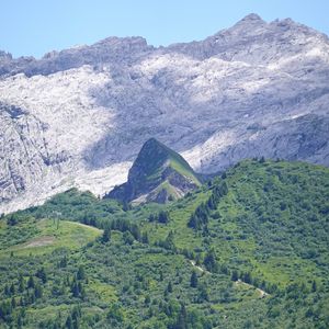 Preview wallpaper mountains, slope, grass, trees