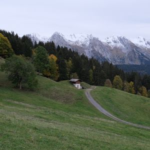 Preview wallpaper mountains, slope, house, trees, landscape, nature