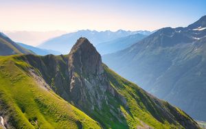 Preview wallpaper mountains, slope, rock, grass, landscape
