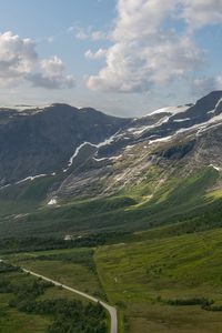 Preview wallpaper mountains, slope, snow, peaks, road, valley