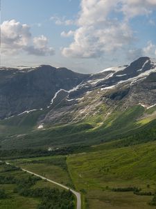 Preview wallpaper mountains, slope, snow, peaks, road, valley