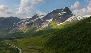 Preview wallpaper mountains, slope, snow, peaks, road, valley