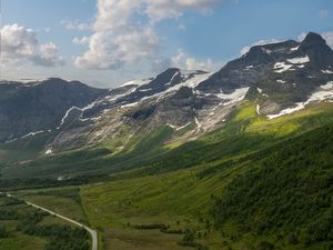 Preview wallpaper mountains, slope, snow, peaks, road, valley