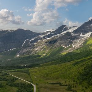 Preview wallpaper mountains, slope, snow, peaks, road, valley