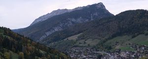 Preview wallpaper mountains, slope, trees, houses, village, valley