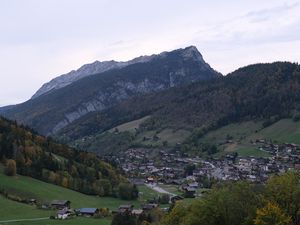 Preview wallpaper mountains, slope, trees, houses, village, valley