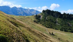 Preview wallpaper mountains, slope, trees, trail