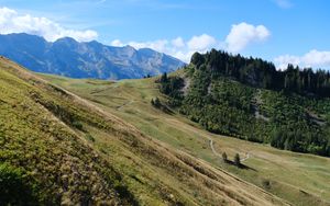 Preview wallpaper mountains, slope, trees, trail