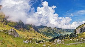 Preview wallpaper mountains, slope, valley, stones, clouds, landscape