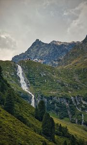 Preview wallpaper mountains, slope, waterfall, house, grass, nature