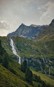 Preview wallpaper mountains, slope, waterfall, house, grass, nature