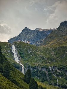 Preview wallpaper mountains, slope, waterfall, house, grass, nature