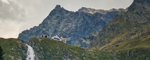 Preview wallpaper mountains, slope, waterfall, house, grass, nature