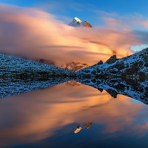 Preview wallpaper mountains, slopes, clouds, lake, reflection, winter, snow, nature