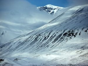 Preview wallpaper mountains, slopes, snow, stones, fog