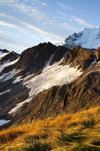 Preview wallpaper mountains, slopes, snow, grass