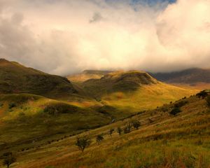 Preview wallpaper mountains, slopes, trees, clouds, light, shadow