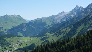 Preview wallpaper mountains, slopes, valley, houses, trees