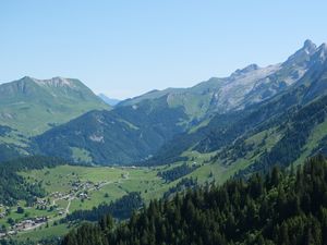 Preview wallpaper mountains, slopes, valley, houses, trees