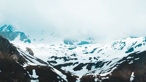 Preview wallpaper mountains, snow, clouds, slope, cliff