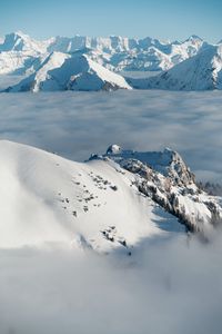 Preview wallpaper mountains, snow, clouds, winter, landscape, aerial view