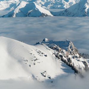 Preview wallpaper mountains, snow, clouds, winter, landscape, aerial view