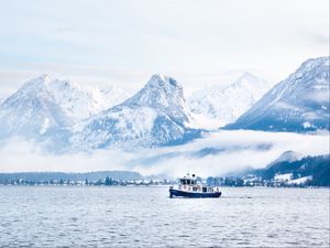 Preview wallpaper mountains, snow, clouds, boat, sea