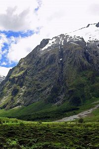 Preview wallpaper mountains, snow, greens, height, sky, greatness