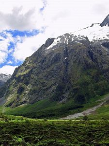 Preview wallpaper mountains, snow, greens, height, sky, greatness