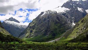 Preview wallpaper mountains, snow, greens, height, sky, greatness