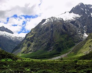 Preview wallpaper mountains, snow, greens, height, sky, greatness