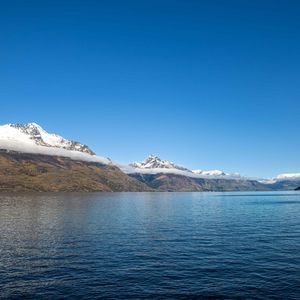 Preview wallpaper mountains, snow, lake, sky, landscape