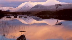 Preview wallpaper mountains, snow, lake, reflection, mirror, evening