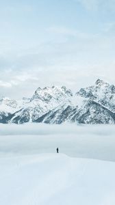 Preview wallpaper mountains, snow, man, silhouette, alone