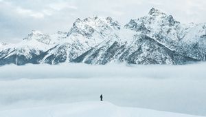 Preview wallpaper mountains, snow, man, silhouette, alone