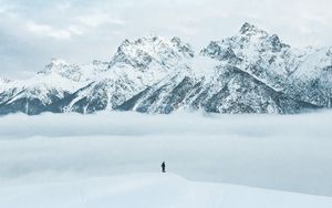 Preview wallpaper mountains, snow, man, silhouette, alone