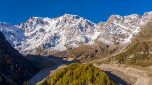 Preview wallpaper mountains, snow, relief, trees, valley