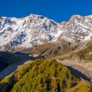 Preview wallpaper mountains, snow, relief, trees, valley