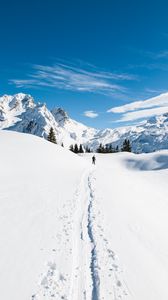 Preview wallpaper mountains, snow, skier, path, snowy