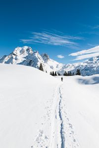 Preview wallpaper mountains, snow, skier, path, snowy