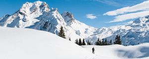 Preview wallpaper mountains, snow, skier, path, snowy