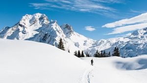 Preview wallpaper mountains, snow, skier, path, snowy