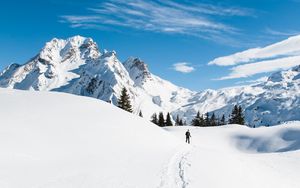 Preview wallpaper mountains, snow, skier, path, snowy