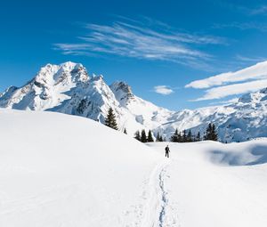 Preview wallpaper mountains, snow, skier, path, snowy