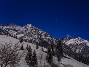 Preview wallpaper mountains, snow, slope, trees, view, landscape, night