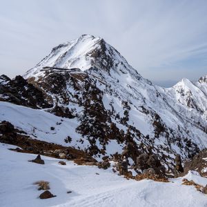 Preview wallpaper mountains, snow, slope, stones