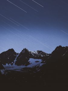 Preview wallpaper mountains, snow, snowy, starfall, stars