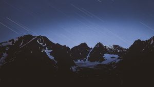 Preview wallpaper mountains, snow, snowy, starfall, stars