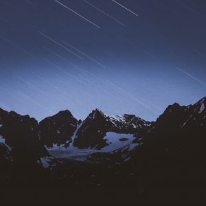 Preview wallpaper mountains, snow, snowy, starfall, stars