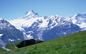 Preview wallpaper mountains, snow, stones, meadow, slope, track, grass